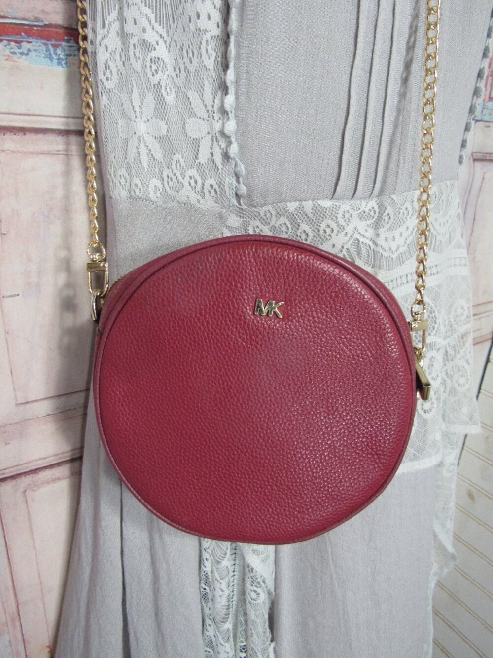 MICHAEL KORS BURGUNDY ROUND XBODY BAG + LONG CHAIN STRAP,